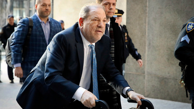 FILE - Harvey Weinstein arrives at a Manhattan courthouse as jury deliberations continue in his rape trial in New York, on Feb. 24, 2020. (AP Photo/John Minchillo, File)