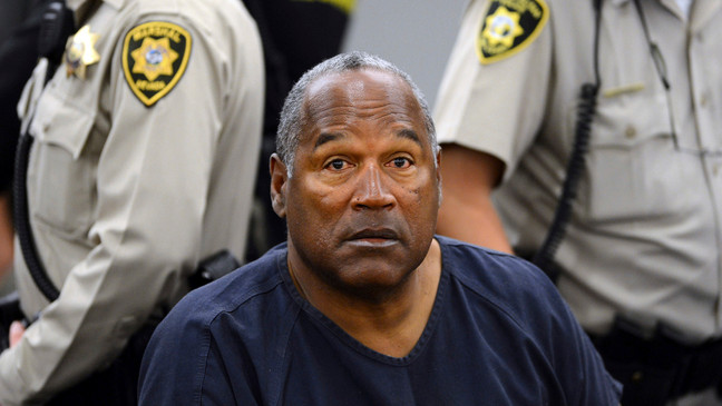 FILE - In this May 14, 2013, file photo, O.J. Simpson sits during a break on the second day of an evidentiary hearing in Clark County District Court in Las Vegas. Simpson, the decorated football superstar and Hollywood actor who was acquitted of charges he killed his former wife and her friend but later found liable in a separate civil trial, has died. He was 76.Â{&nbsp;}  (AP Photo/Ethan Miller, Pool, File)