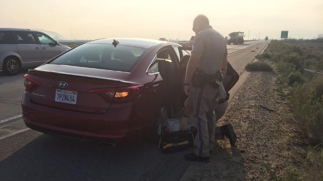 California Highway Patrol officers delivered a healthy baby boy on the side of a Kern County freeway, Tuesday, Feb. 14, 2017. (California Highway Patrol - Buttonwillow)