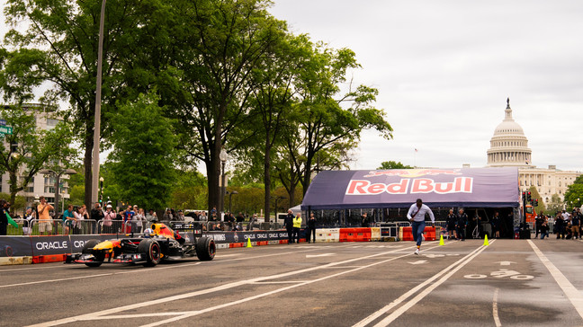 Former NFL quarterback Robert Griffin III prepares to race Formula One champion David Coulthard during an event in Washington, D.C. on April 20, 2024. (Photo courtesy Emilee Fails / Red Bull Content Pool)