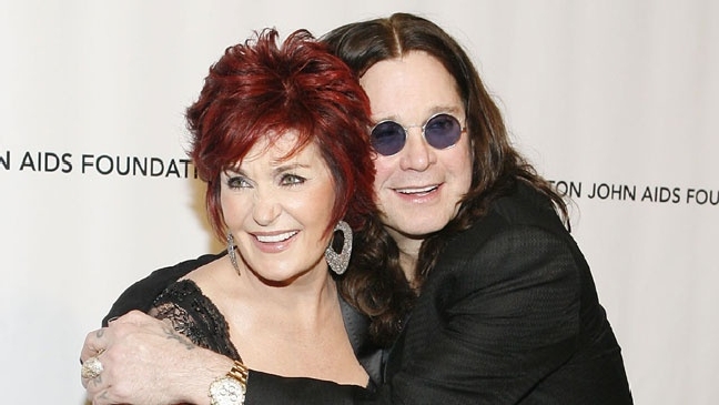 Osbourne and his wife, Sharon Osbourne, smile as they arrive at the "An Enduring Vision" benefit for the Elton John AIDS foundation in New York City on Sept. 25, 2007.