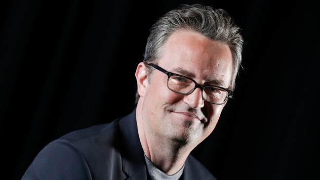 File - Matthew Perry poses for a portrait on Feb. 17, 2015, in New York. Perry, who starred as Chandler Bing in the hit series âFriends,â has died. He was 54. The Emmy-nominated actor was found dead of an apparent drowning at his Los Angeles home on Saturday, according to the Los Angeles Times and celebrity website TMZ, which was the first to report the news. Both outlets cited unnamed sources confirming Perryâs death. His publicists and other representatives did not immediately return messages seeking comment. (Photo by Brian Ach/Invision/AP)