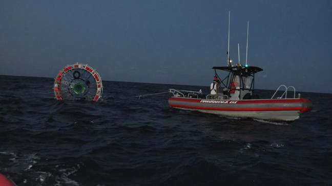 FILE - These photos are from CBS12 News exclusive from Reza "Ray" Baluchi's trip in 2016 when he was rescued by the U.S. Coast Guard. In these photos, he was rescued about two miles off Singer Island. (WPEC)