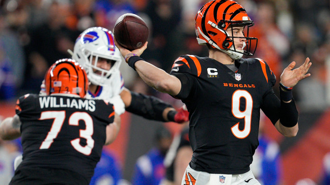 Cincinnati Bengals quarterback Joe Burrow (9) looks to throw during an NFL football game against the Buffalo Bills, Monday, Jan. 2, 2023, in Cincinnati. (AP Photo/Jeff Dean)