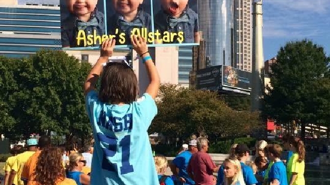 Mom gets boy with Down syndrome meeting with OshKosh after spun by ad agency (Photos: Meagan Nash and Crystal Barbee Photography)