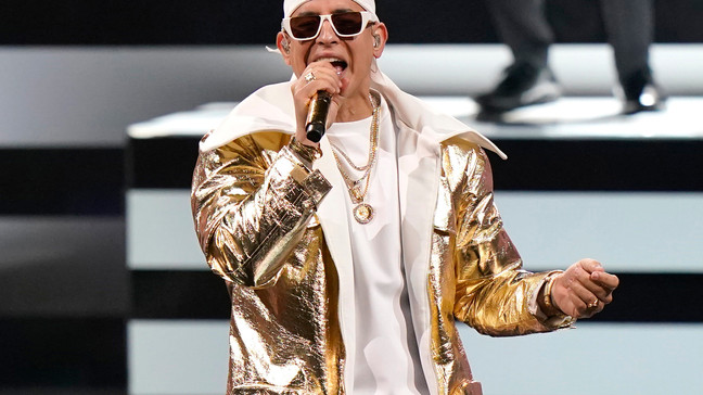 FILE - Daddy Yankee performs at Premio Lo Nuestro on Feb. 16, 2021, in Miami. The reggaeton star announced on Sunday March 20, 2022 that he will retire after his farewell tour, "La Última Vuelta," promoting his upcoming album "Legendaddy," (The Last Round). (AP Photo/Lynne Sladky, File)