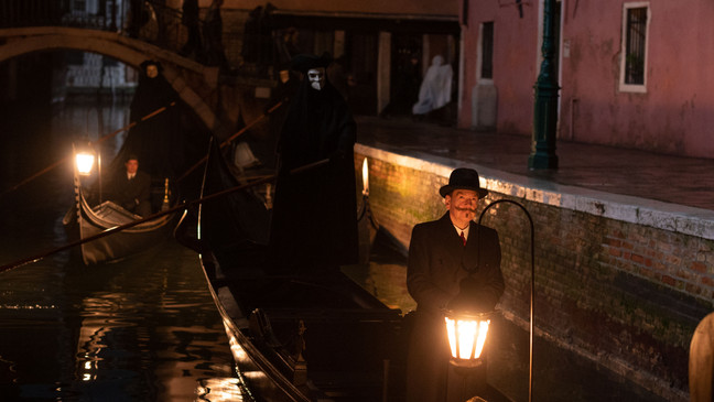(L-R): Riccardo Scamarcio as Vitale Portfoglio and Kenneth Branagh as Hercule Poirot in 20th Century Studios' A HAUNTING IN VENICE. Photo by Rob Youngson. Â© 2023 20th Century Studios. All Rights Reserved.