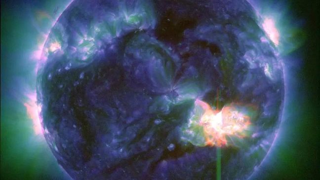 This image provided by NASA shows a solar flare, as seen in the bright flash in the lower right,  captured by NASAâs Solar Dynamics Observatory on May 9, 2024. A severe geomagnetic storm watch has been issued for Earth starting Friday and lasting all weekend  _ the first in nearly 20 years. (NASA/SDO via AP)