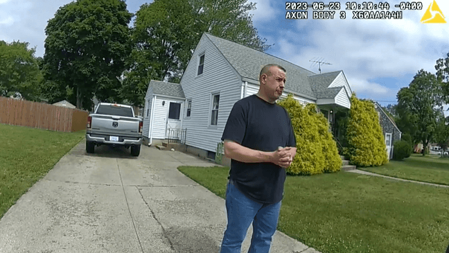 Body camera footage from the Cranston Police Department in R.I. shows authorities confronting a convicted sex offender, Christopher Jones, who has been accused of spying on his neighbor with a drone. (Courtesy of the Cranston Police Department)