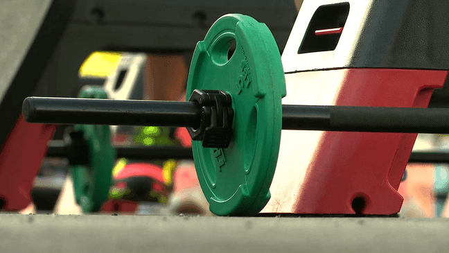 MAY 28, 2022 - Brenda Osteen, the beloved owner of the Pump House Fitness Center in Hendersonville, celebrated her 70th birthday on Saturday, May 28, by leading gym members and others in the community in an early-morning workout in which everyone was assigned 70 repetitions of each exercise. (Photo credit: WLOS staff)