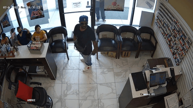 Awkward attempted robbery caught on camera in Georgia (Courtesy: Crime Stoppers Greater Atlanta)