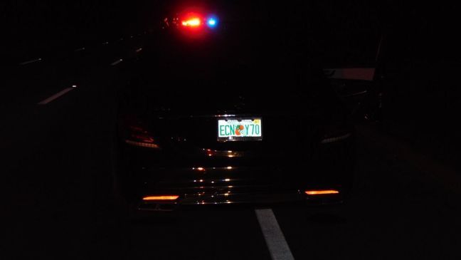 Photos show Tiger Woods' car on the side of the road in Jupiter, Fla. on the morning of his DUI arrest. (Jupiter Police Department)