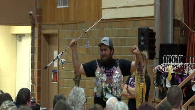 Men model special designed bras{&nbsp;}for the "Bras for a Cause" charity auction. (KTVO)