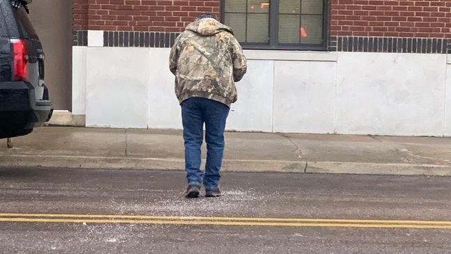 A Muskogee, Okla., woman posted these sweet photos of her father showing up to her work this week and pouring salt on the ground so she wouldn’t slip walking inside. (Provided photos: Elizabeth Bautista Boyd)