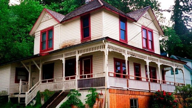 The house featured in the Steven Spielberg film "The Goonies" is seen in Astoria, Ore., on May 24, 2001. The Victorian home, built in 1896 with sweeping views of the Columbia River as it flows into the Pacific Ocean, is now for sale has been listed with an asking price of $1.7 million. Since the film was released in 1985, fans have flocked to the home, and the owner has long complained of constant crowds and trespassing. (AP Photo/Stepanie Firth, File)