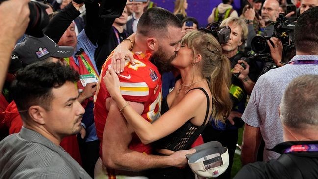 FILE - Kansas City Chiefs tight end Travis Kelce (87) kisses Taylor Swift after the Kansas City Chiefs defeated the San Francisco 49ers at the Super Bowl on Feb. 11, 2024, in Las Vegas. (AP Photo/John Locher, File)