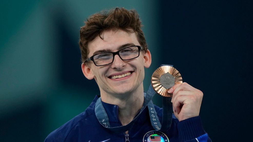 Stephen Nedoroscik, of the United States, celebrates after winning the bronze medal during the men's artistic gymnastics individual pommel finals at Bercy Arena at the 2024 Summer Olympics, Saturday, Aug. 3, 2024, in Paris, France. (AP Photo/Charlie Riedel)