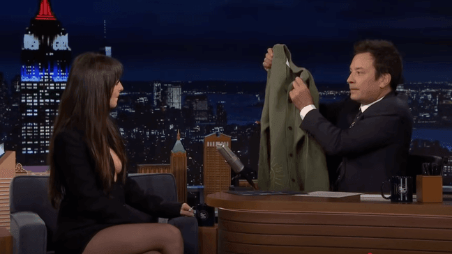 Jimmy Fallon presented Johnson with a sweater he received from her dad, "Miami Vice" star Don Johnson. (Courtesy: NBC)