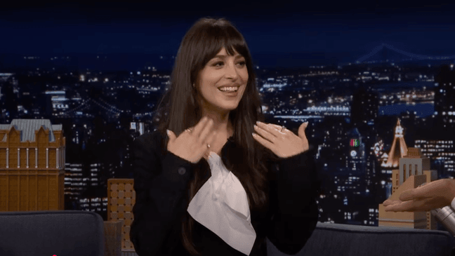 At one point, Johnson attempted to cover her dress with a tissue, handed to her by Jimmy Fallon. (Courtesy: NBC)