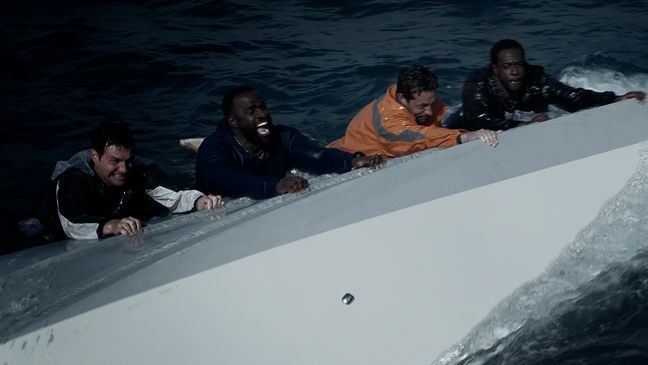 Nick Schuyler (Zachary Levi) and Will Bleakley (Marshall Cook), both former University of South Florida football players, and NFL players, Marquis Cooper (Quentin Plair) and Corey Smith (Terrence Terrell) attempt to survive in "Not Without Hope." (Courtesy Inaugural Entertainment)