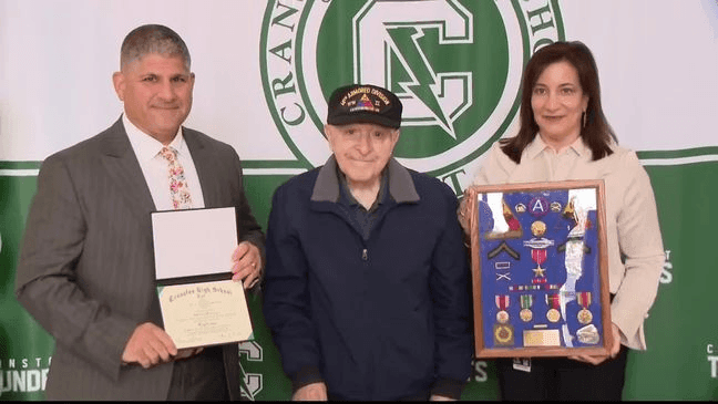 Anthony Simeone, a 98-year-old World War II veteran, was awarded his high school diploma from Cranston East. (WJAR)