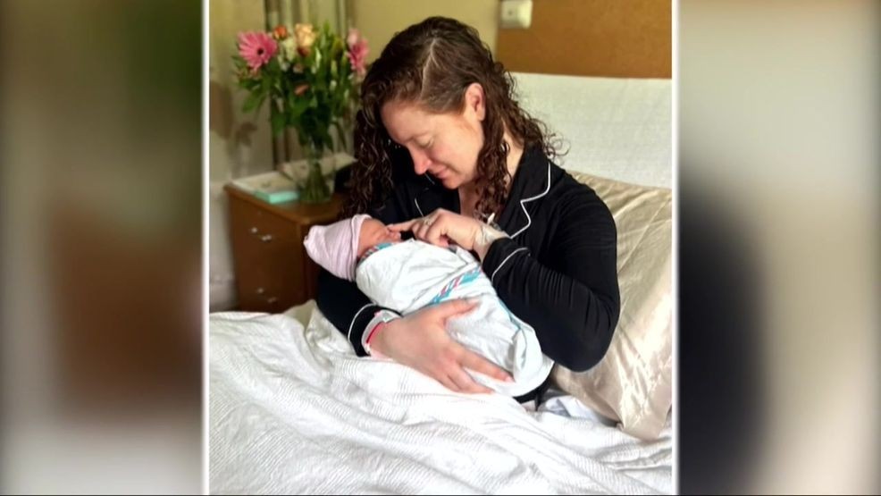 Image for story: Meet Baby Quincy: making his debut after Olivia's viral labor