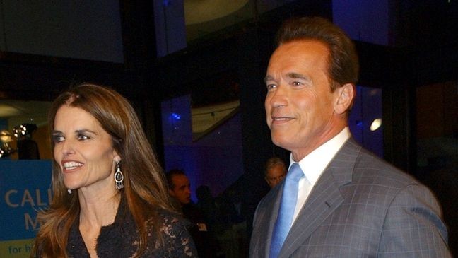 FILE - California Gov. Arnold Schwarzenegger and first lady Maria Shriver arrive at the California Museum for History, Women and the Arts for a ceremony to induct the first 13 individuals into the California Hall of Fame in Sacramento, Calif., on Dec. 6, 2006. (AP Photo/Steve Yeater, File)