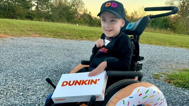 River Crouch dressed up as a Dunkin' Donuts worker for Halloween to show his love for the place. (Credit: Alliance Marketing Partners)