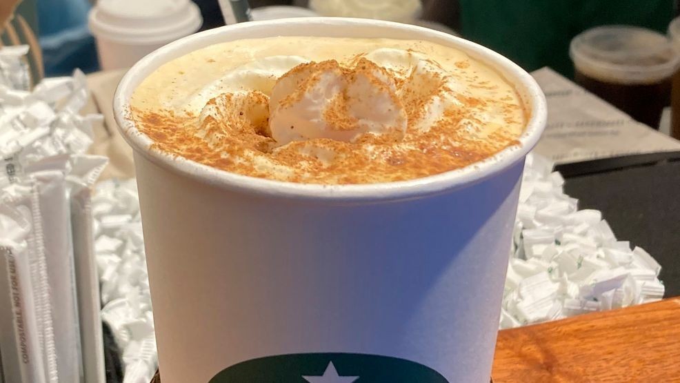 A Pumpkin Spice Latte drink rests on a counter at a Starbucks in New York on Thursday, Aug. 24, 2023. The seasonal drink that made pumpkin spice a star is marking two decades in the world. (AP Photo/Peter Morgan)