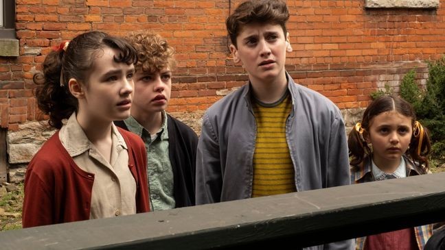 Clara Stack, Mikkal Karim-Fidler, Jack Molloy Legault and Matilda Legault are some of the kids on Pennywise's case in "It: Welcome to Derry." (Courtesy HBO)