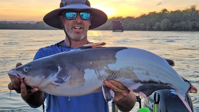 Professional guide, Capt. Aaron Massey, usually watches his clients reel in catfish, piebald or otherwise. But he was excited when he had the opportunity to reel this piebald himself earlier this year. (Photo courtesy Capt. Aaron Massey)