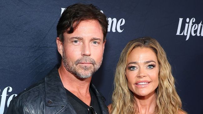 LOS ANGELES, CALIFORNIA - AUGUST 08: (L-R) Aaron Phypers and Denise Richards attend the Tempted by Love Premiere Event Presented by Terry McMillan at IPIC Westwood on August 08, 2024 in Los Angeles, California. (Photo by Leon Bennett/Getty Images for A+E Networks)