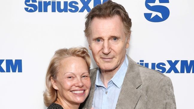 Pamela Anderson and Liam Neeson attend SiriusXM's Town Hall with the cast of "The Naked Gun" hosted by Andy Cohen (Credit: Cindy Ord/Getty Images for SiriusXM)