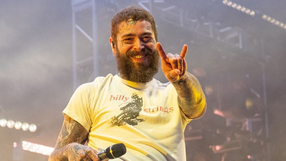 Image for story: Watch Post Malone fall off stage during concert after announcing split from girlfriend