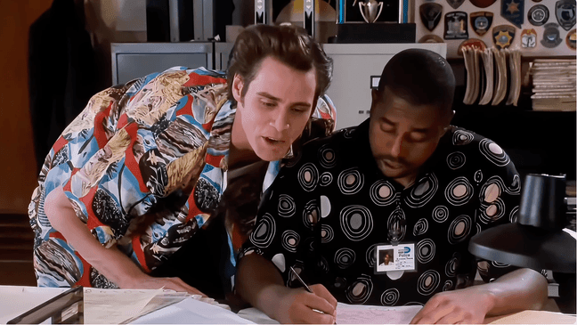 Jim Carrey and Tone Loc in "Ace Ventura: Pet Detective." (Courtesy: Warner Bros. Pictures)