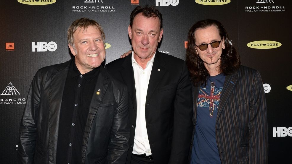 Image for story: Rush opens up on 'difficult decision' to do 2026 reunion tour after death of Neil Peart
