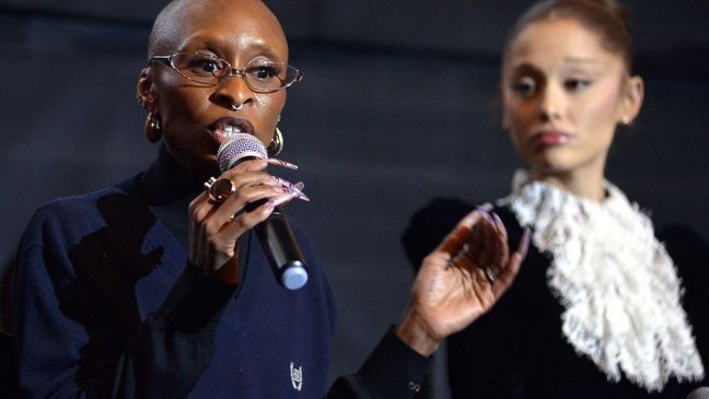 LOS ANGELES, CALIFORNIA - NOVEMBER 15: (L-R) Cynthia Erivo and Ariana Grande speak as Universal Pictures presents a special "Wicked For Good" Q&A at AMC Century City 15 on November 15, 2025 in Los Angeles, California. (Photo by Unique Nicole/Getty Images for Universal Pictures)