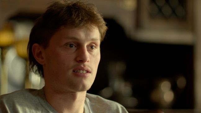 Hunter Johnson called 911 immediately upon discovering his friends, but faced accusations from online sleuths accusing him of being the killer. (Courtesy of Prime Video)