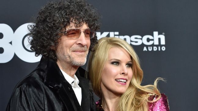 Howard Stern and his wife, Beth, arrive at the red carpet before the Rock and Roll Hall of Fame induction ceremony, Saturday, April 14, 2018, in Cleveland. (AP Photo/David Richard)