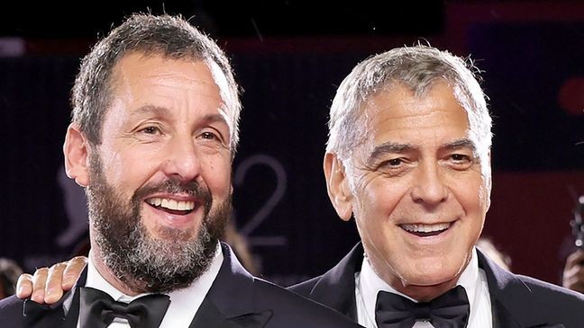 VENICE, ITALY - AUGUST 28: (L-R) Adam Sandler and George Clooney attend the "Jay Kelly" red carpet during the 82nd Venice International Film Festival on August 28, 2025 in Venice, Italy. (Photo by Theo Wargo/Getty Images)
