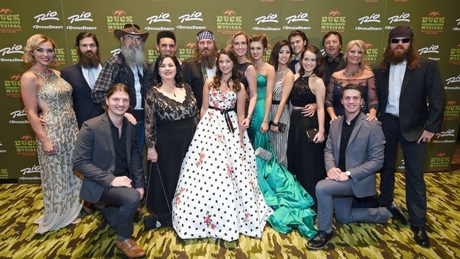 (L-R, front) Television personalities Reed Robertson, Kay Robertson, Bella Robertson and Cole Robertson, and (L-R, back) Jessica Robertson, Jep Robertson, Si Robertson, Will Robertson, Willie Robertson, Korie Robertson, Sadie Robertson, Rebecca Robertson, John Luke Robertson, Mary Kate McEacharn, Alan Robertson, Lisa Robertson and Jase Robertson (Photo by Ethan Miller/Getty Images)
