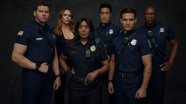 "9-1-1" stars Oliver Stark as Buck, Jennifer Love Hewitt as Maddie, Angela Bassett as Athena, Kenneth Choi as Chimney, Ryan Guzman as Eddie, and Aisha Hinds as Hen. (Disney/Justin Stephens)