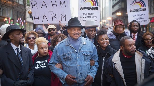 CHICAGO, IL - DECEMBER 06:  Reverend Jesse Jackson (C) leads demonstrators down State Street to protest the death of Laquan McDonald and the alleged cover-up that followed on December 6, 2015 in Chicago, Illinois. Chicago Police officer Jason Van Dyke shot and killed 17-year-old McDonald on October 20, 2014, hitting him with 16 bullets. Van Dyke was charged with murder more than a year after the shooting after a judge ordered the release to the public of a video which showed McDonald backing away from Van Dyke while being shot.  (Photo by Scott Olson/Getty Images)
