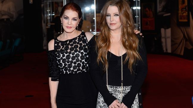 LAS VEGAS, NV - APRIL 23:  Actress Priscilla Presley (L) and singer Lisa Marie Presley attend the ribbon-cutting ceremony during the grand opening of "Graceland Presents ELVIS: The Exhibition - The Show - The Experience" at the Westgate Las Vegas Resort & Casino on April 23, 2015 in Las Vegas, Nevada.  (Photo by Bryan Steffy/WireImage)