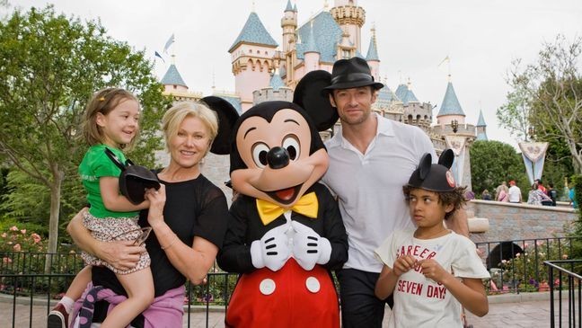 Actor Hugh Jackman, his wife Deborra Lee Furness, and children Oscar Jackman and Ava Jackman pose{&nbsp;} at Disneyland in Anaheim, Calif. (Credit: Paul Hiffmeyer/Disneyland)