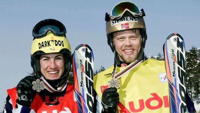 RUKA, FINLAND - MARCH 18: Ophelie David of France (L) and Audun Groenvold of Norway pose with their bronze medals after the men and women's Ski Cross event at the Freestyle Ski World Championships 2005, on March 18, 2005 in Ruka, Finland.  (Photo by Agence Zoom/Getty Images)