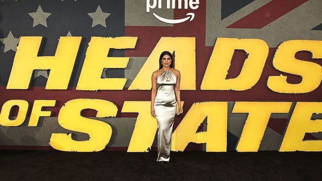Priynka Chopra Jonas goes braless in silver satin gown at{&nbsp;} World Premiere of “Heads of State” (Credit: Dave Allocca / StarPix )