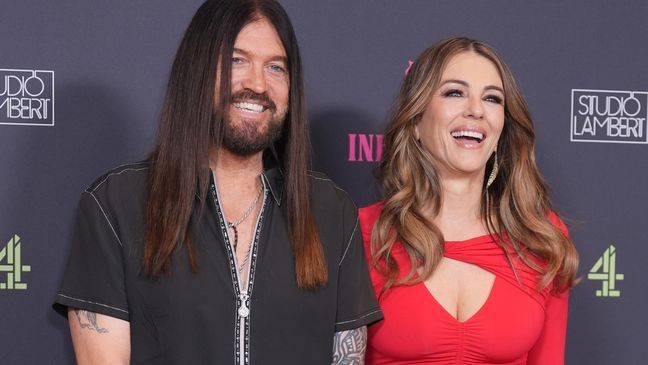 Billy Ray Cyrus and Elizabeth Hurley attending the premiere at The Ned in London, for The Inheritance, Channel 4's new show in which 13 strangers are summoned to a grand stately home. They are there to compete for part of the fortune left in the will of The Deceased, a glamorous benefactor played by Hurley. Picture date: Wednesday August 6, 2025. (Photo by Yui Mok/PA Images via Getty Images)