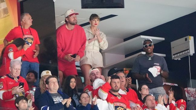 Travis Kelce and singer Taylor Swift are seen during the first period of Game Four of the 2025 Stanley Cup Final between the Edmonton Oilers and the Florida Panthers at Amerant Bank Arena on June 12, 2025 in Sunrise, Florida. (Photo by Brian Babineau/NHLI via Getty Images)