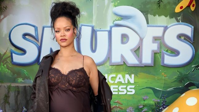 Pregnant Rihanna shares her progress on Fenty Kids clothing line at the Los Angeles Premiere “Smurfs” at in Los Angeles, California. (Photo by Amy Sussman/Getty Images)